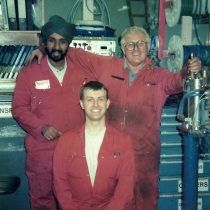 Three guys from the Central Maintenance team (one a Sikh) pose for the camera 2013.